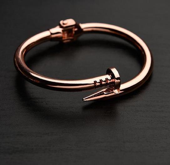 Men’s & Women’s Spring Nail Bracelet – Luxury Minimalist Metal Bangle, High-Fashion Design